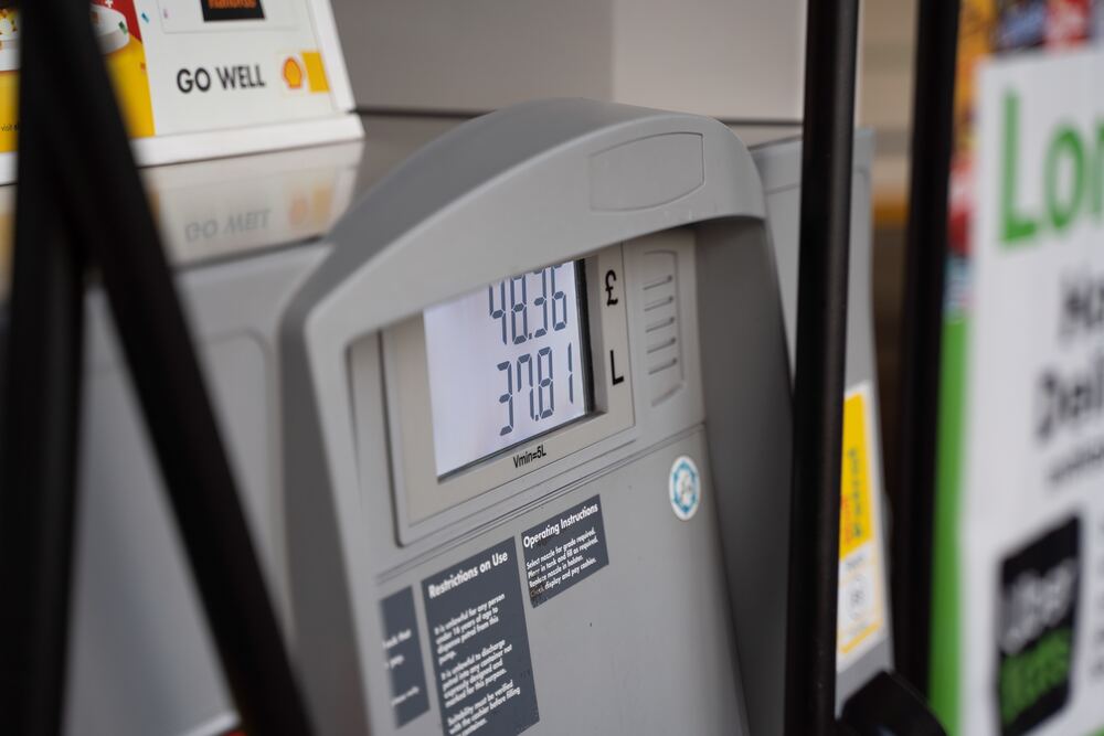 An image of a gas pump displaying the cost of gas that represents comparing gas prices which is one of many unusual frugal tips shared in this blog post.