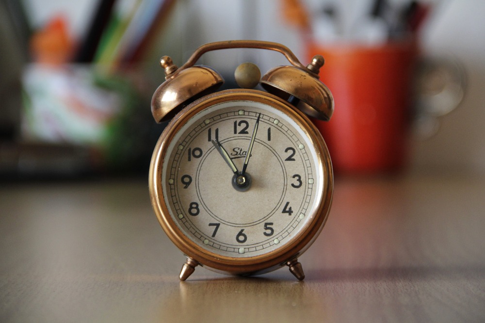 An alarm clock that symbolizes the importance of getting an early start when doing a no-buy year.