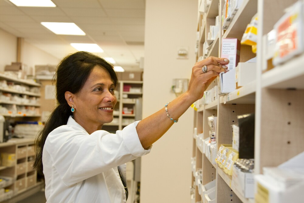 A pharmacy technician pulling medicine for a patient.